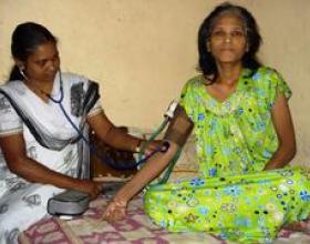 Woman getting her blood pressure taken